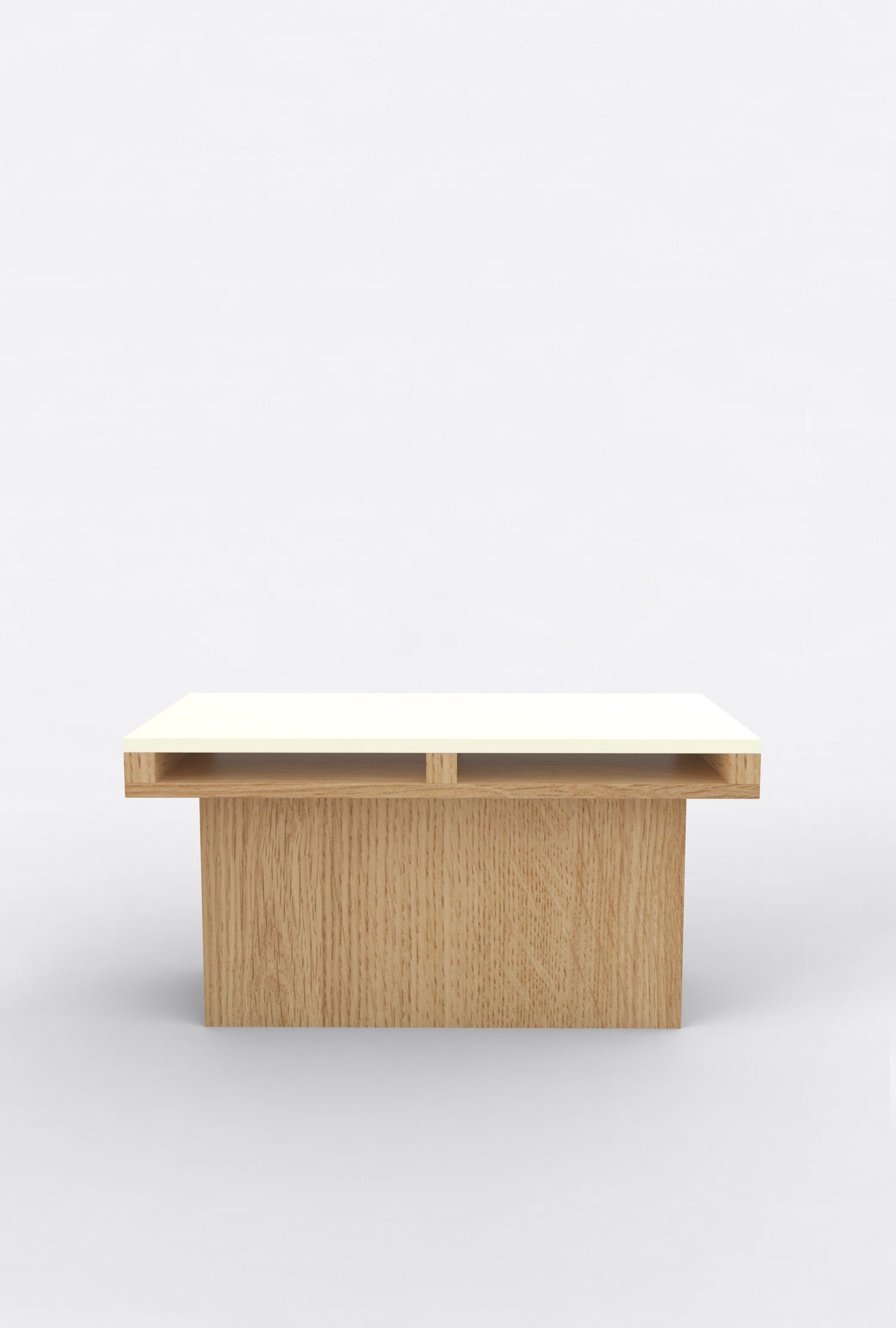 Orphan Work 102 End Table
Shown in oak and white and off-white
Available in natural oak with painted top
Measures: 31” L x 15” D x 15” H

Orphan work is designed to complement in the heart of Soho, New York City. Each piece is handmade in New York