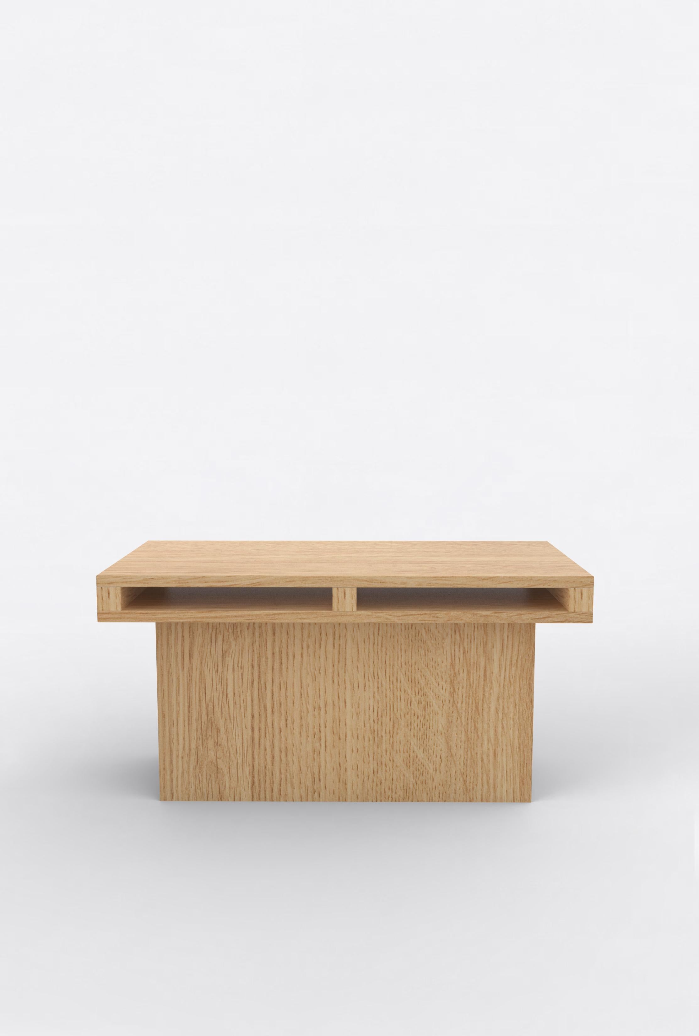 Orphan Work 102 End Table
Shown in oak.
Available in natural oak.
Measures: 31” L x 15” D x 15” H

Orphan work is designed to complement in the heart of Soho, New York City. Each piece is handmade in New York and Los Angeles by traditional artisans.