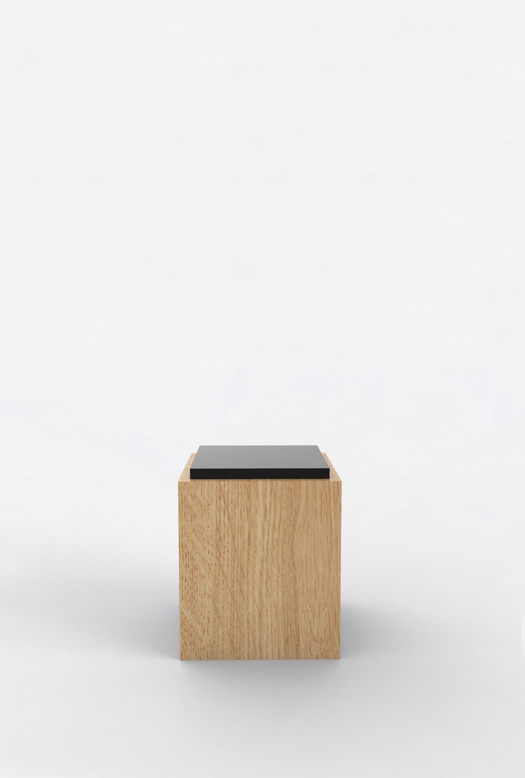 Orphan work 103 side table
Shown in oak and black
Available in natural oak with painted top
Measures: 15” W x 15” D x 18” H

Orphan work is designed to complement in the heart of Soho, New York City. Each piece is handmade in New York and Los