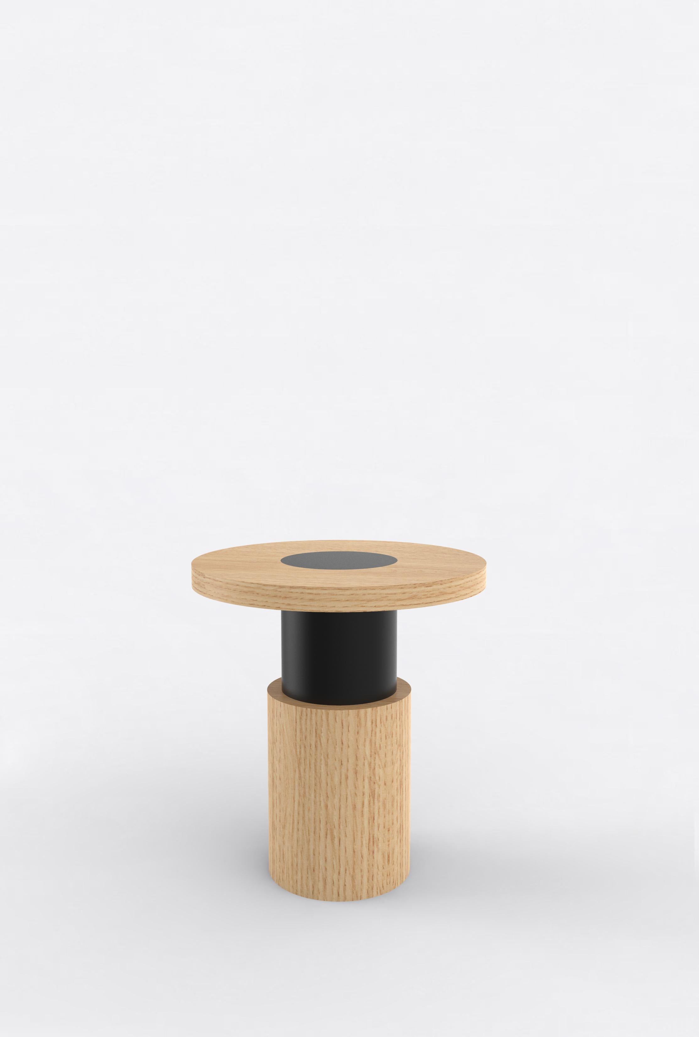 Orphan work 105 End Table, 2020
Shown in oak and black
Available in natural oak with painted base
Measures: 20” diameter x 22” height

Orphan work is designed to complement in the heart of Soho, New York City. Each piece is handmade in New York and