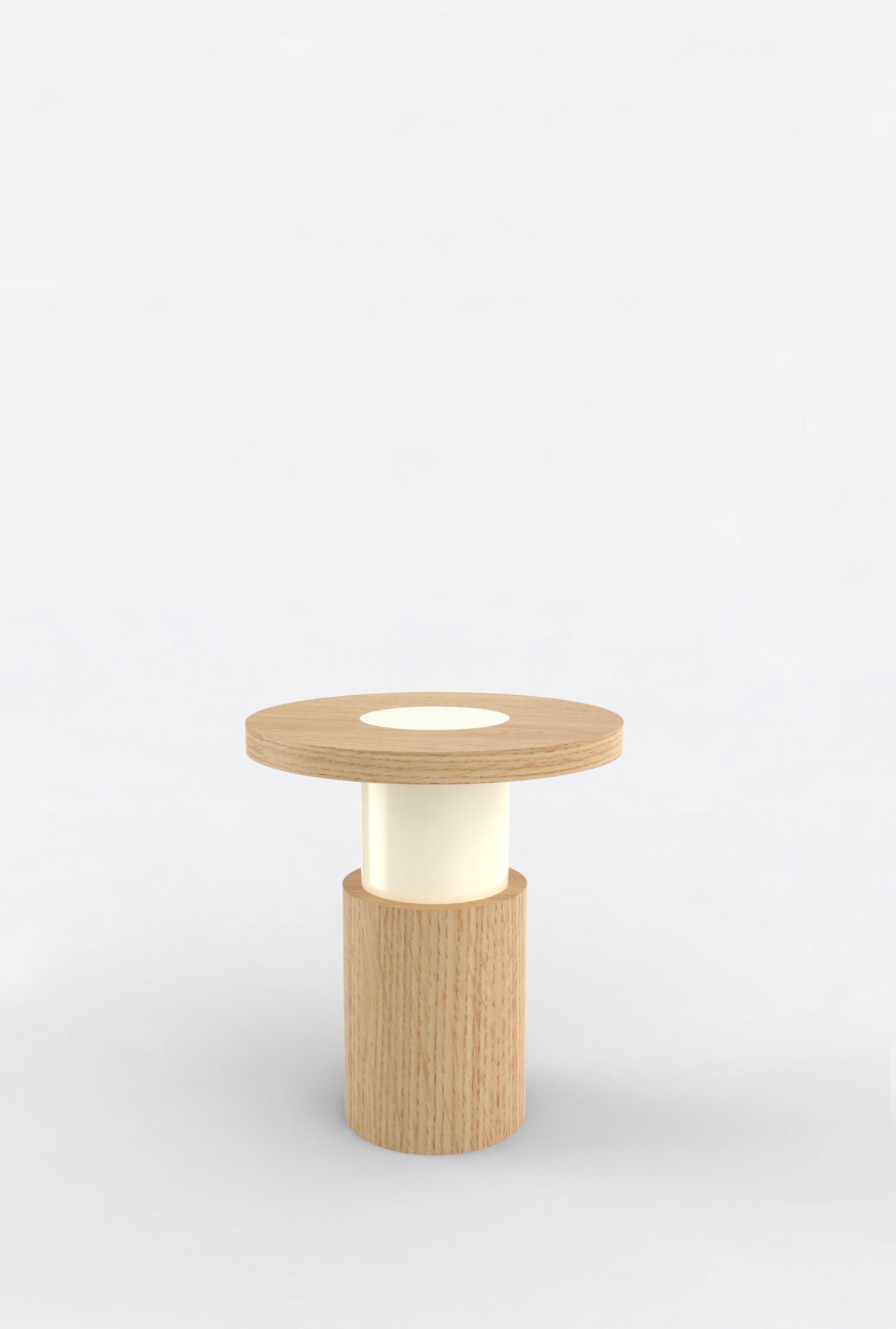 Orphan work 105 End Table
Shown in oak and white or off-white
Available in natural oak with painted base
Measures: 20” diameter x 22” height

Orphan work is designed to complement in the heart of Soho, New York City. Each piece is handmade in New