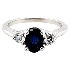 Contemporary 1.09 Carat Oval Dark Blue Sapphire and Diamond 14k White Gold Ring