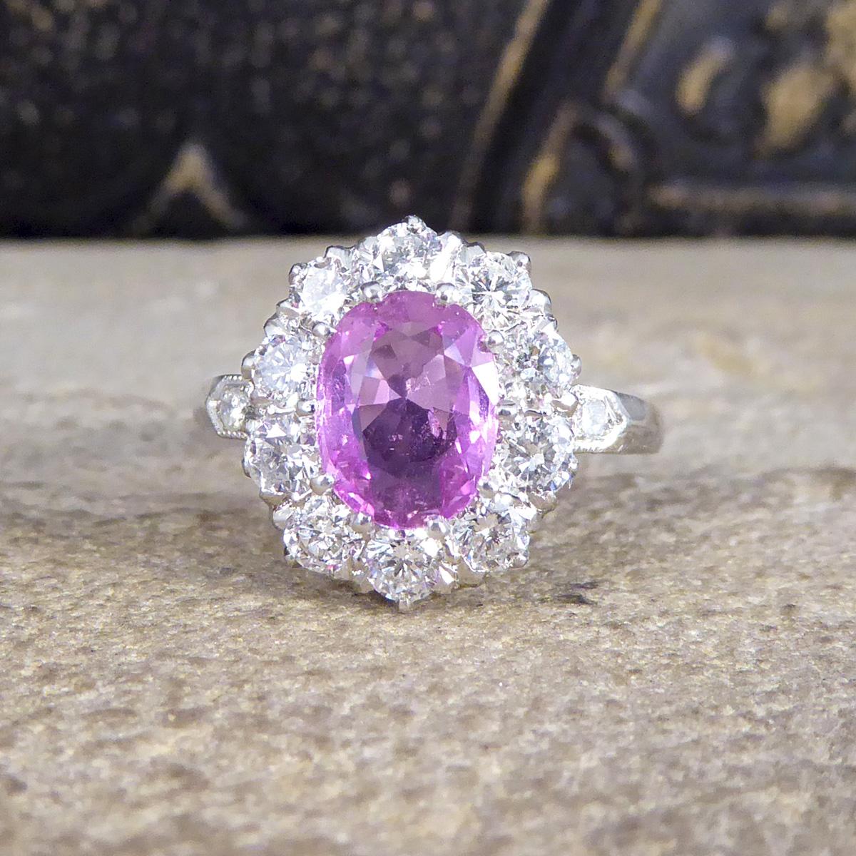 Contemporary 1.15ct Pink Sapphire and Diamond Cluster Ring in Platinum In Excellent Condition In Yorkshire, West Yorkshire