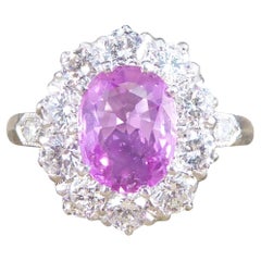 Contemporary 1.15ct Pink Sapphire and Diamond Cluster Ring in Platinum