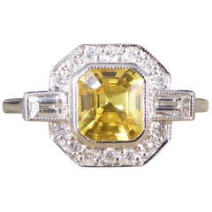 Used Contemporary 1.20 Carat Yellow Sapphire and Diamond Ring in Platinum