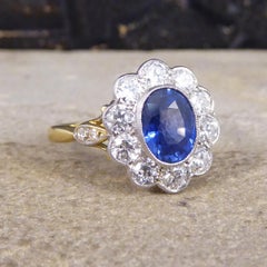Contemporary 1.25 Carat Sapphire and Diamond Cluster Ring in 18 Carat Gold