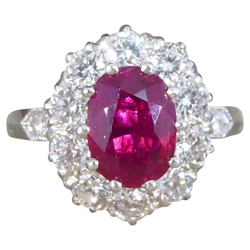 Contemporary 1.28ct Ruby and 0.95ct Diamond Cluster Ring in Platinum For Sale
