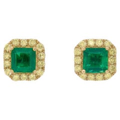 Contemporary 1.29ct Emerald and Fancy Yellow Diamond Earrings