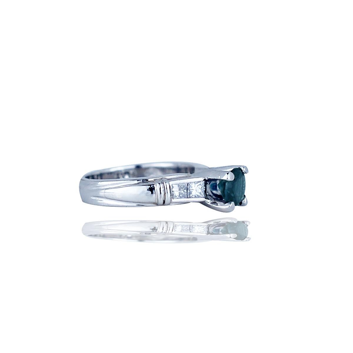 Contemporary, Platinum, Bluish Spinel and Princess Diamond Ring, 1.30 TCW 
The (4) princess cut diamonds measure 2.3 mm with estimated weight of .40 carats. 
Setting is a wide 4.70 mm setting made of platinum and is a sturdy setting. 
The center