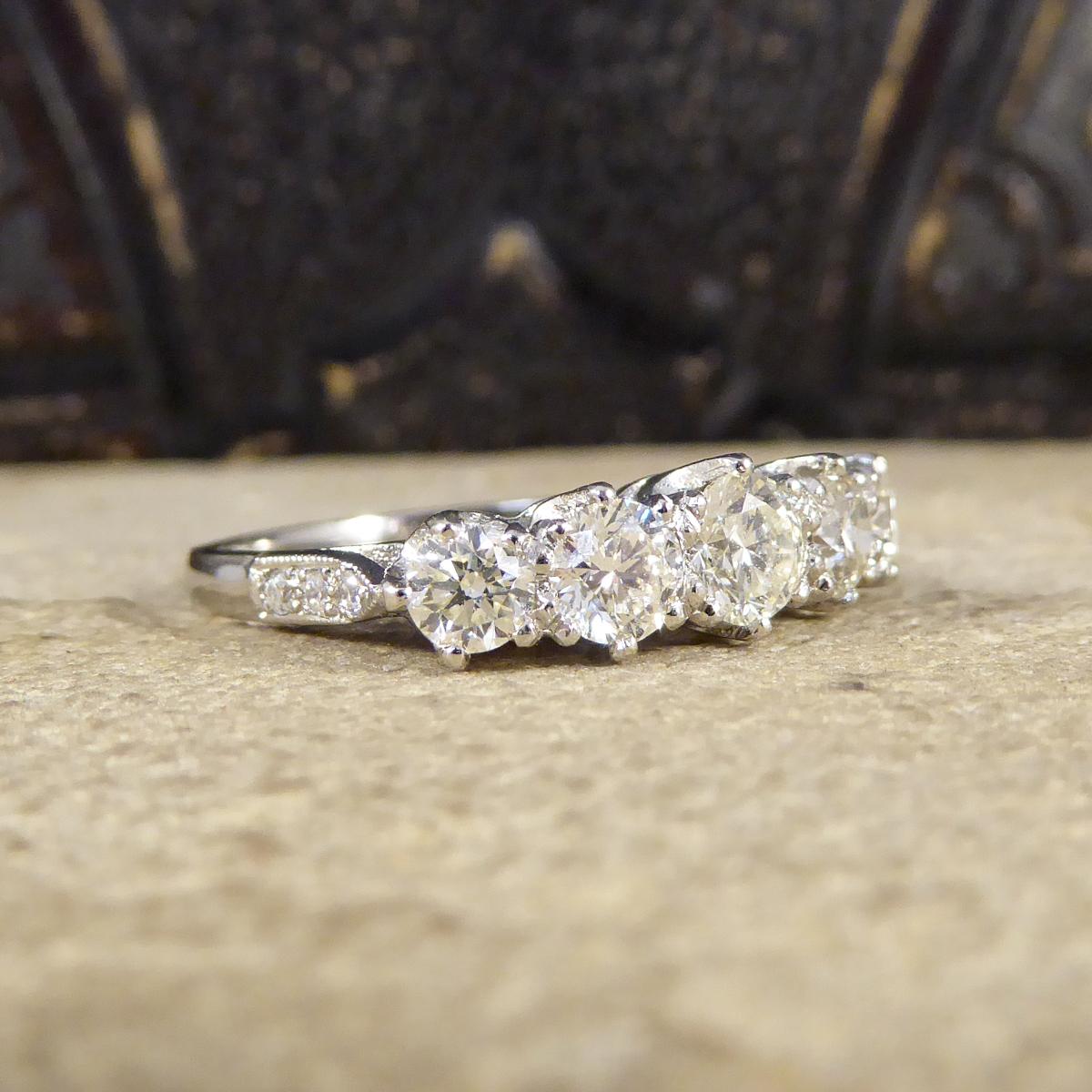 The five beautifully sparkly Modern Brilliant cut Diamonds are set in a secure Platinum claw setting, and weigh approximately 1.30ct in total very slightly graduating in size. Sitting in a setting measuring 5mm from the finger this ring can be