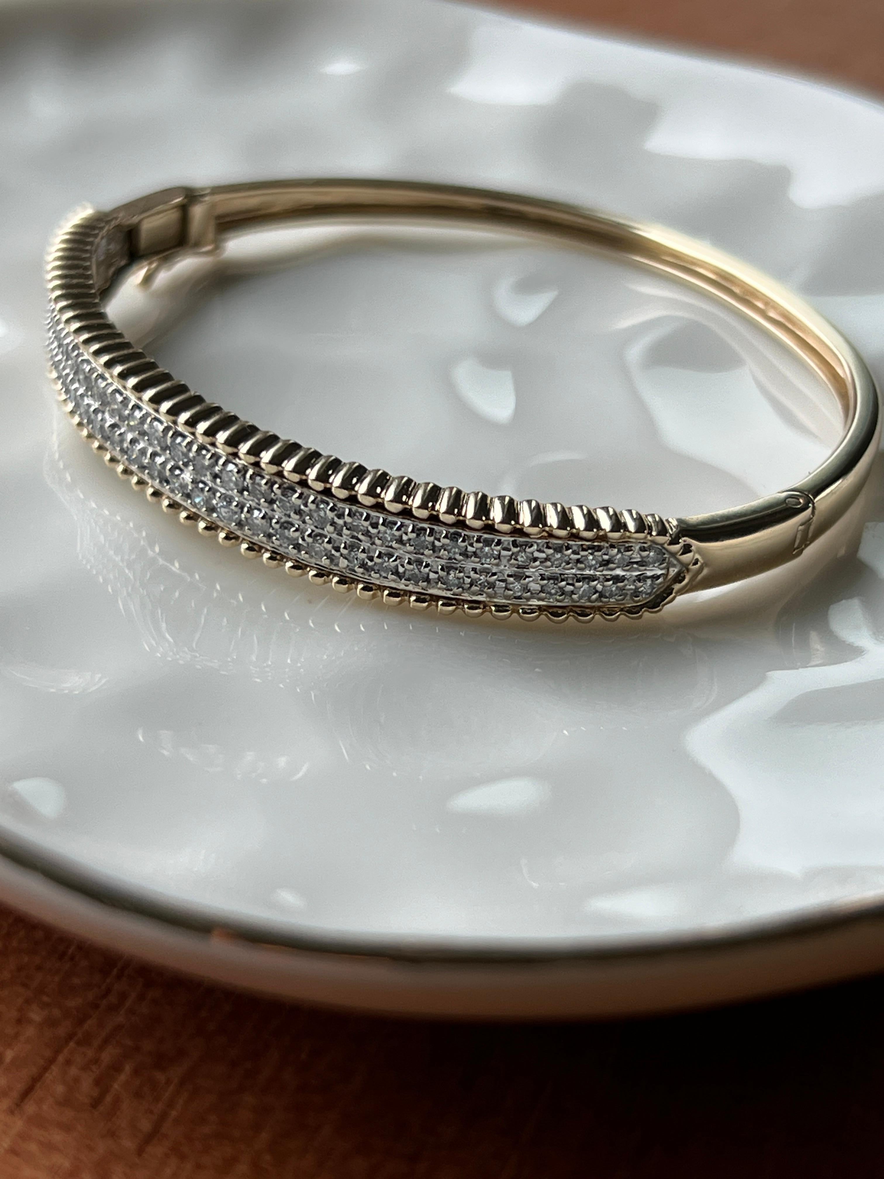 Round Cut Contemporary 1.32 TCW Diamond 14k Yellow and White Gold Hinged Bangle Bracelet For Sale