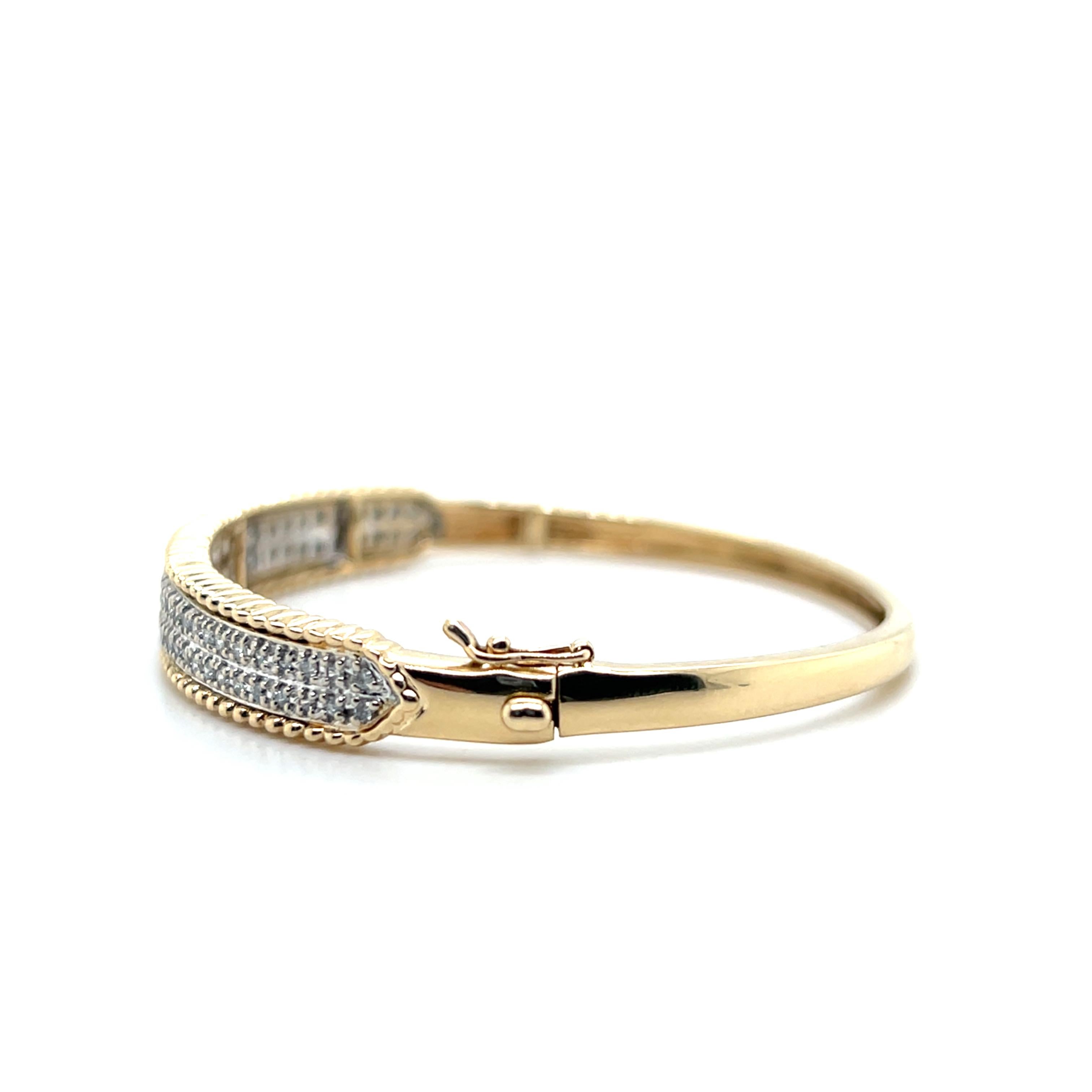 Contemporary 1.32 TCW Diamond 14k Yellow and White Gold Hinged Bangle Bracelet For Sale 1