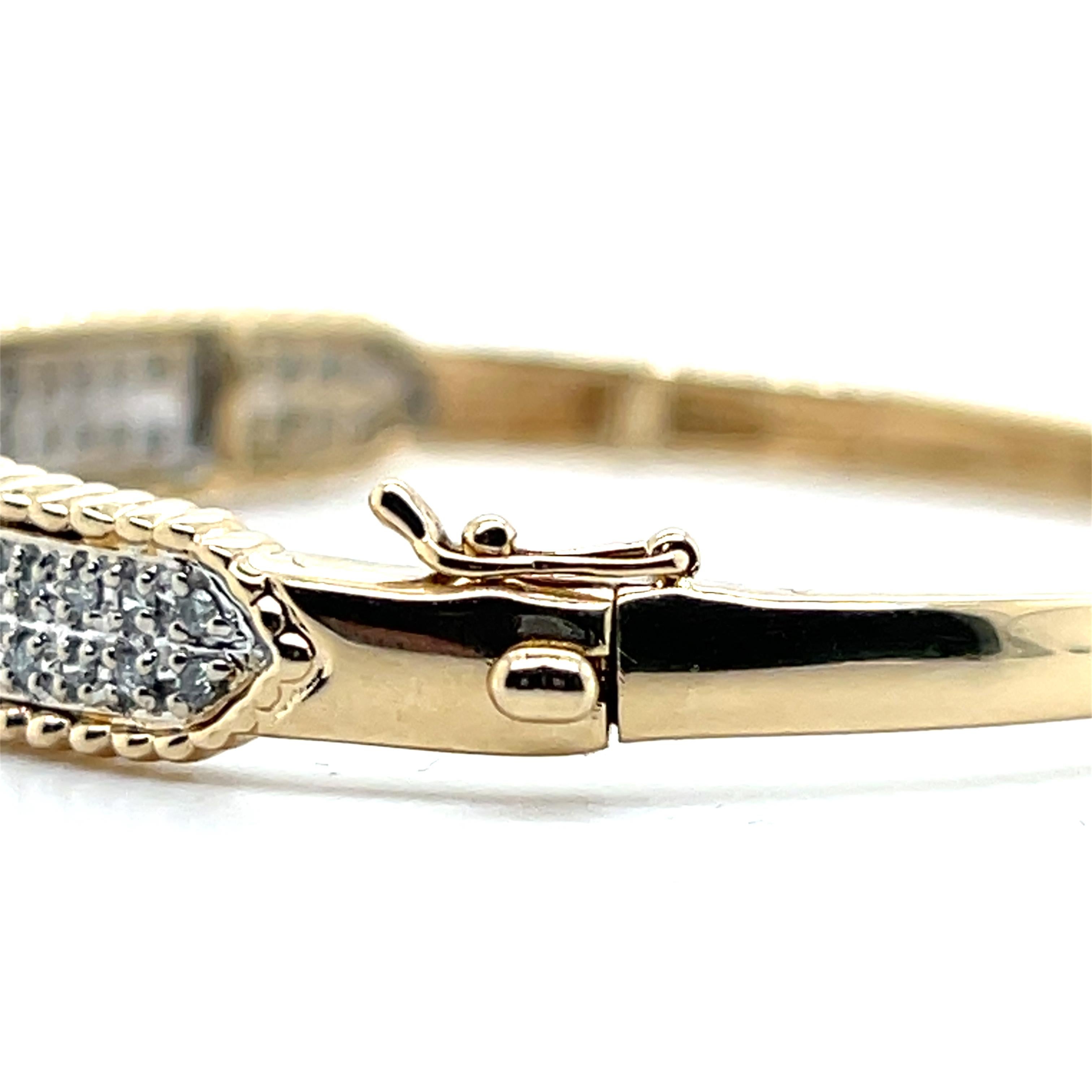 Contemporary 1.32 TCW Diamond 14k Yellow and White Gold Hinged Bangle Bracelet For Sale 4