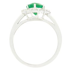 Contemporary 1.34ct Emerald and Diamond Cluster Ring