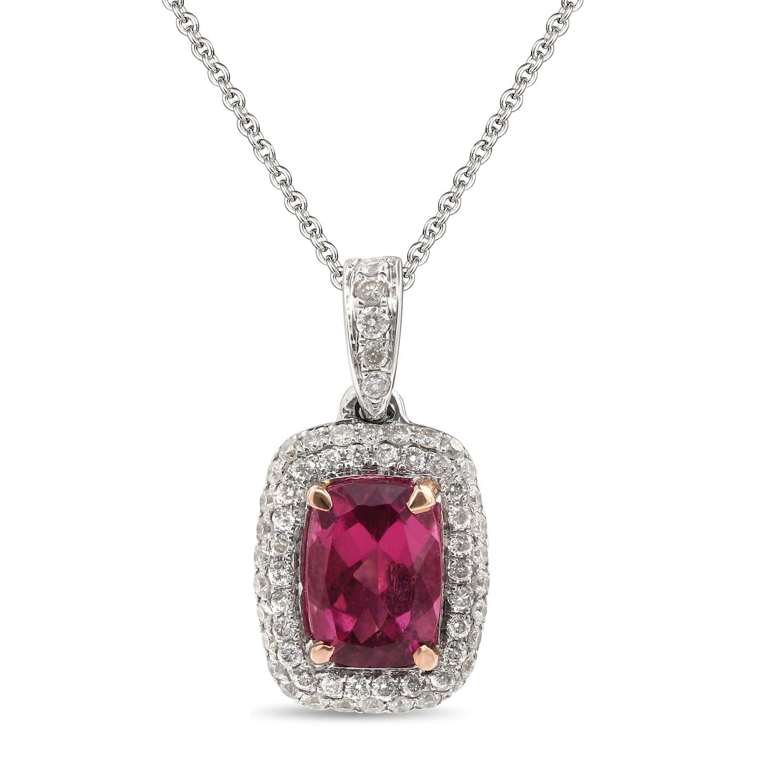 Contemporary 14 Karat White gold, Rubellite, and Diamond Pendant.

Diamonds of approximately 0.25 carats, Rubellite of approximately 0.79 carats mounted on 14 karat white gold pendant. The pendant weighs approximately 1.57 grams.

Please note: The