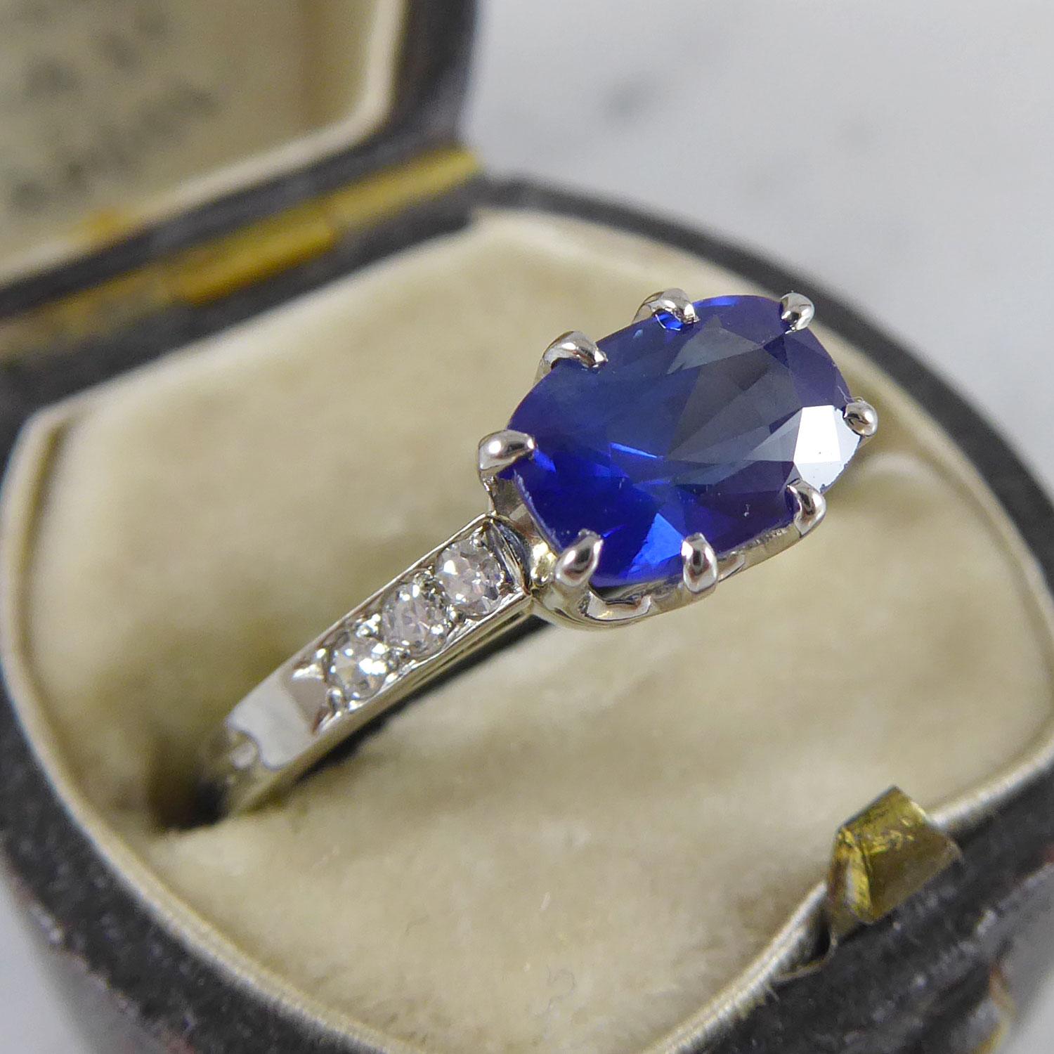 Cushion Cut Contemporary 1.41 Carat Sapphire Ring with Diamond Set Shoulders, French