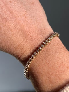 Contemporary 1.44 tcw Diamond Two Tone 14k Gold Twisted Rope Bracelet