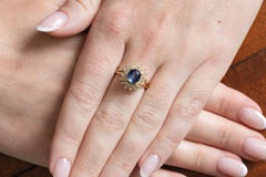 Contemporary 14K Gold Ring with Natural Sapphire 32 brilliant-cut diamonds