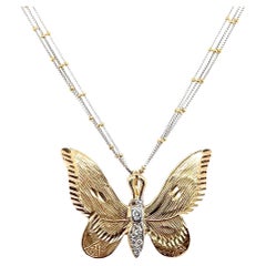 Ciondolo a farfalla con diamante in oro bicolore 14k contemporaneo