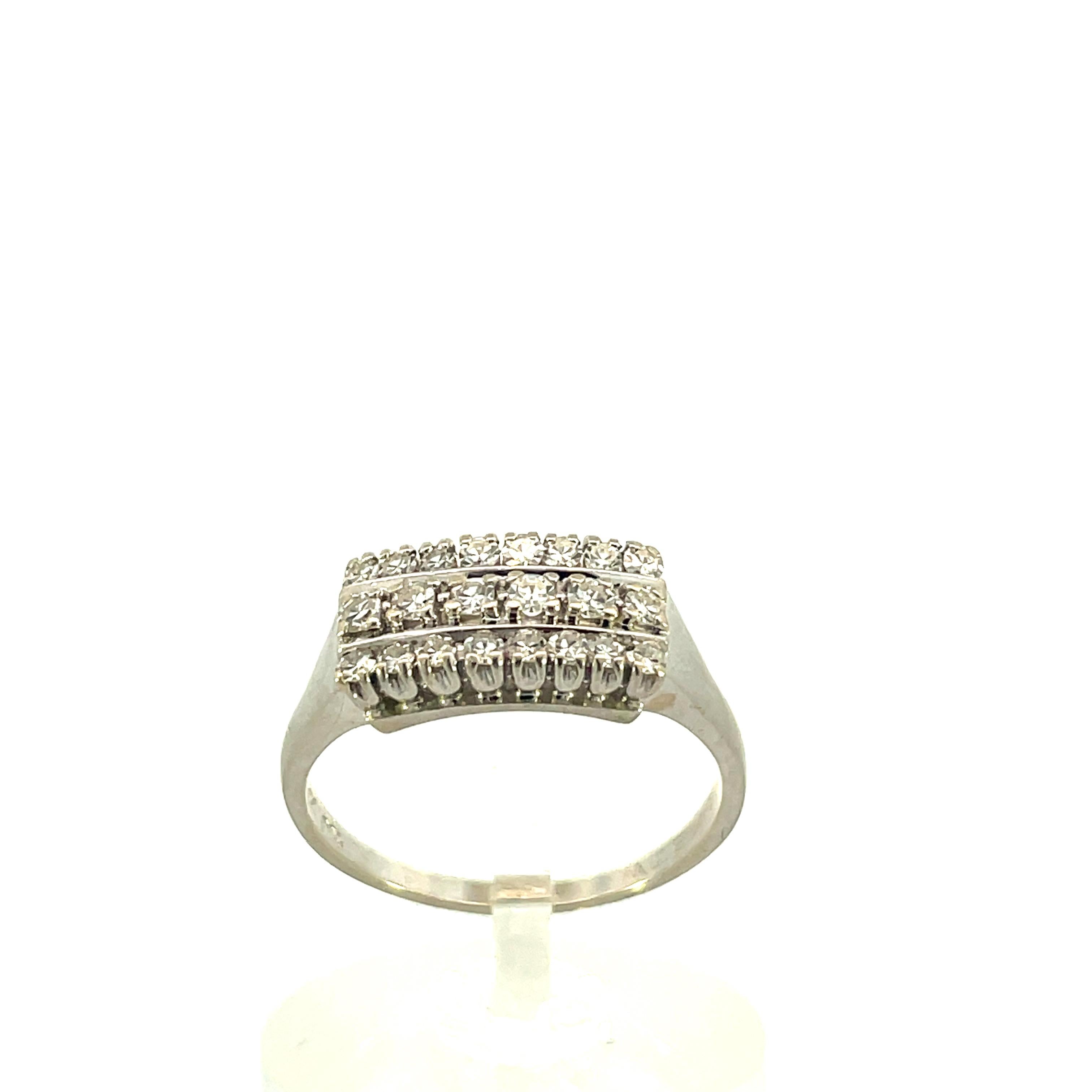 - 14K white gold 
- .50 tw = 22 Single Cut Diamonds 
- SI1 clarity G color 
- Size 8.75 


This contemporary diamond ring, made in 14k white gold, is a stunning copy of an original 1920s ring. This version of the ring in white gold is much lighter,