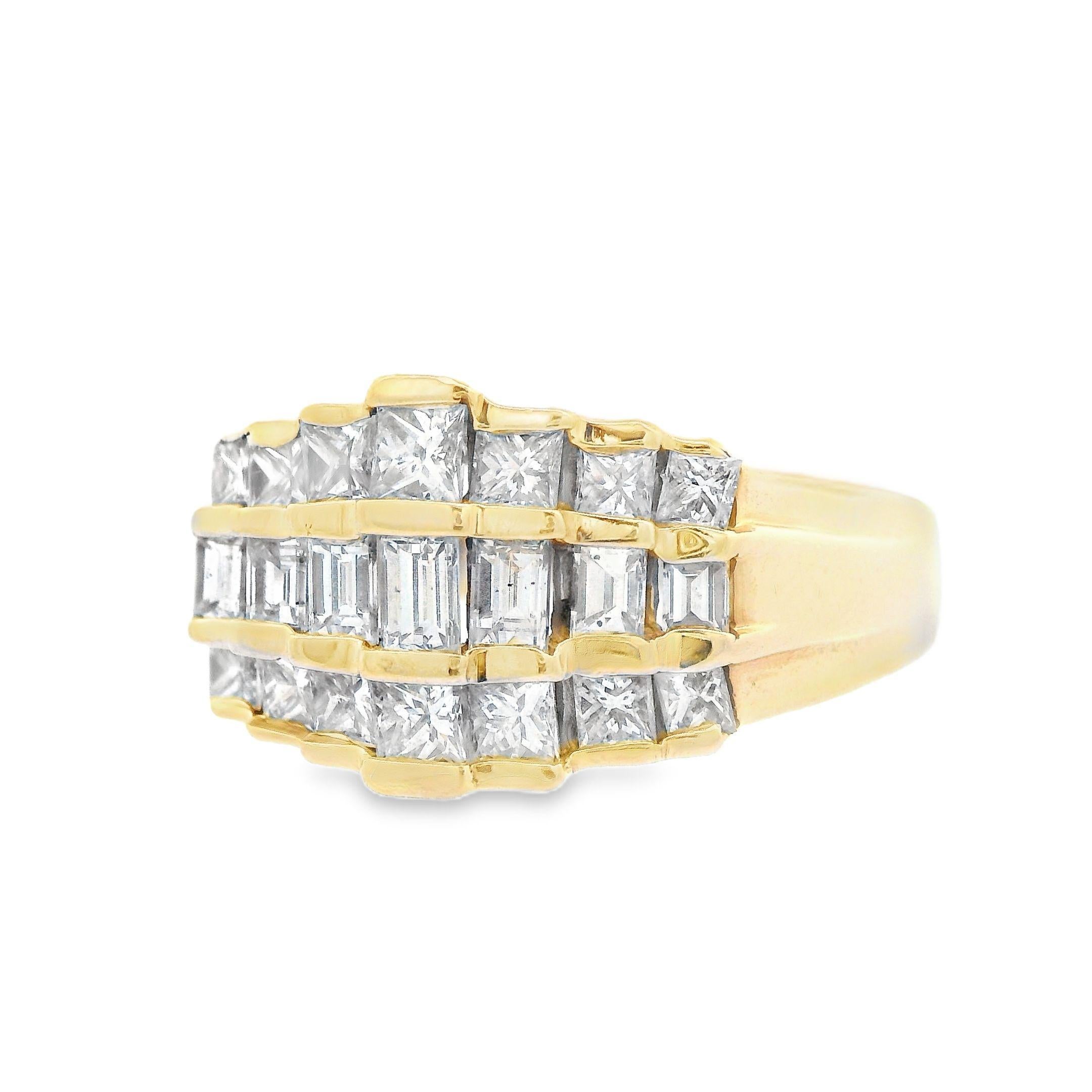 Being made with both princess and baguette cut diamonds, this contemporary 14k yellow gold ring is perfect for anyone who desires a diamond ring that sparkles intensely, stands out amongst the rest, and will stand the test of time. The diamonds are