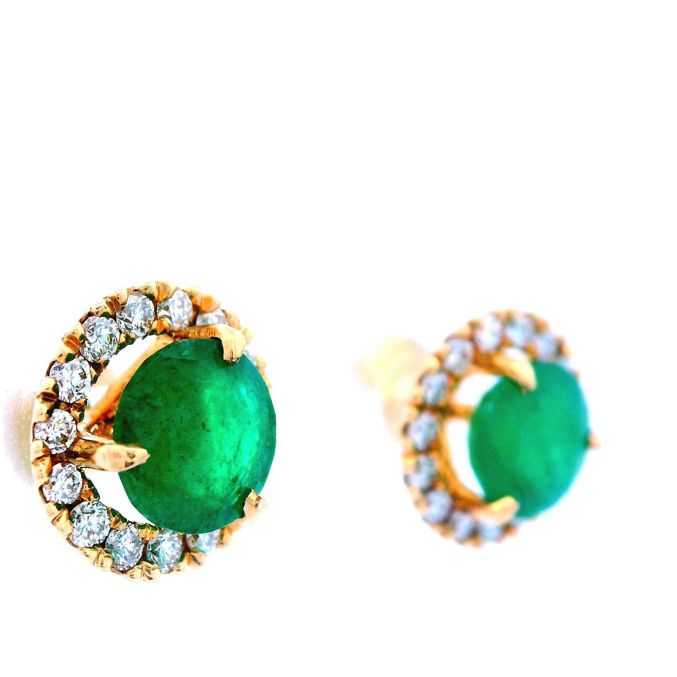 These contemporary 14k yellow gold halo earrings with diamond and emerald are stunning. The photos and videos do these earrings no justice. These earrings feature floating, round cut, emerald centers stones that are surrounded by a halo of 14k