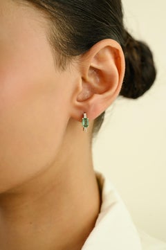 Contemporary 14K Yellow Gold Huggie Hoop Earrings with 1.02 Ct Emerald & Diamond