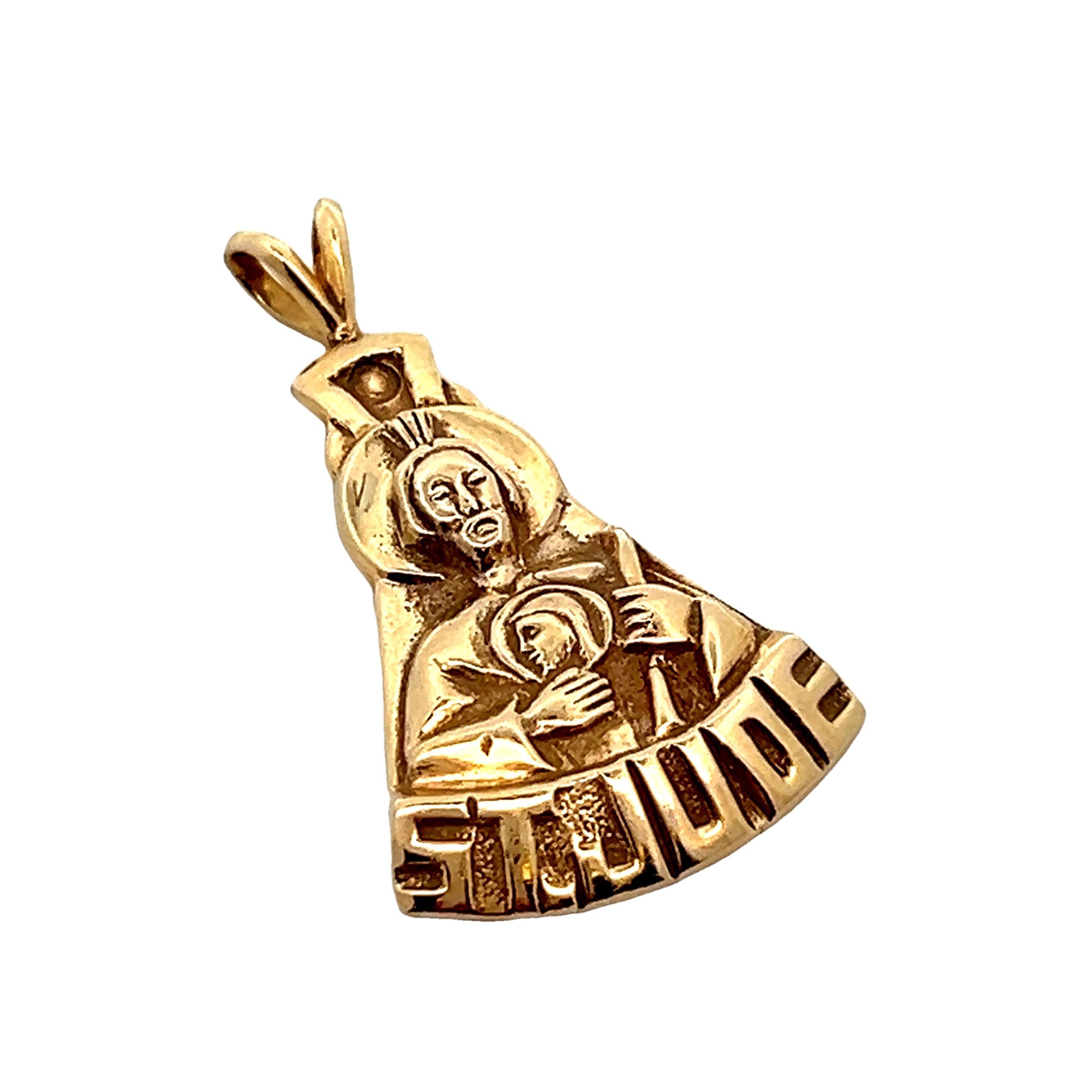 This is a contemporary 14k yellow gold St. Jude pendant. This features a classic depiction of St. Jude with the spelling 
