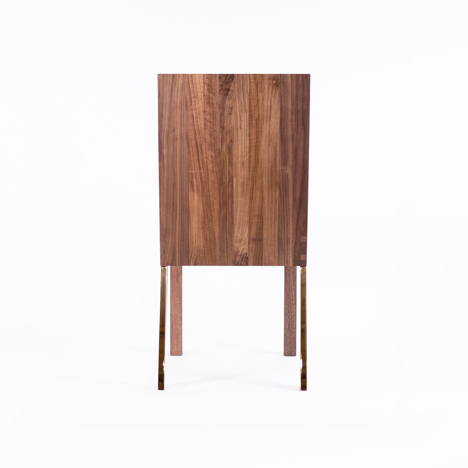 This dining/occasional chair is notable for its nuanced simplicity of form, carefully detailed classic wood joinery and precision steel fabrication.

As the name implies, the 1.5 is the fifth and final iteration of a case study on modular