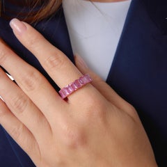 Contemporary 15.00 carat pink sapphire 14k rose gold eternity band