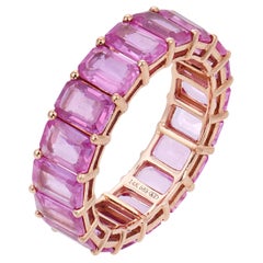 Contemporary 15.00 carat pink sapphire 14k rose gold eternity band