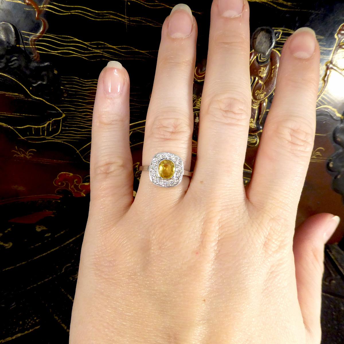Contemporary 1.50 Carat Yellow Sapphire and Diamond Cluster Ring in Platinum For Sale 1