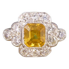 Contemporary 1.50 Carat Yellow Sapphire and Diamond Cluster Ring in Platinum