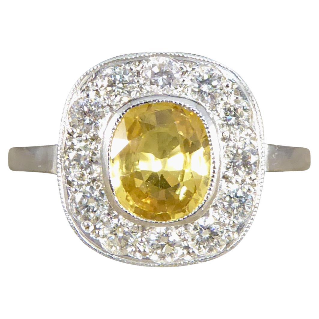 Contemporary 1.50 Carat Yellow Sapphire and Diamond Cluster Ring in Platinum For Sale