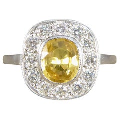 Contemporary 1.50 Carat Yellow Sapphire and Diamond Cluster Ring in Platinum