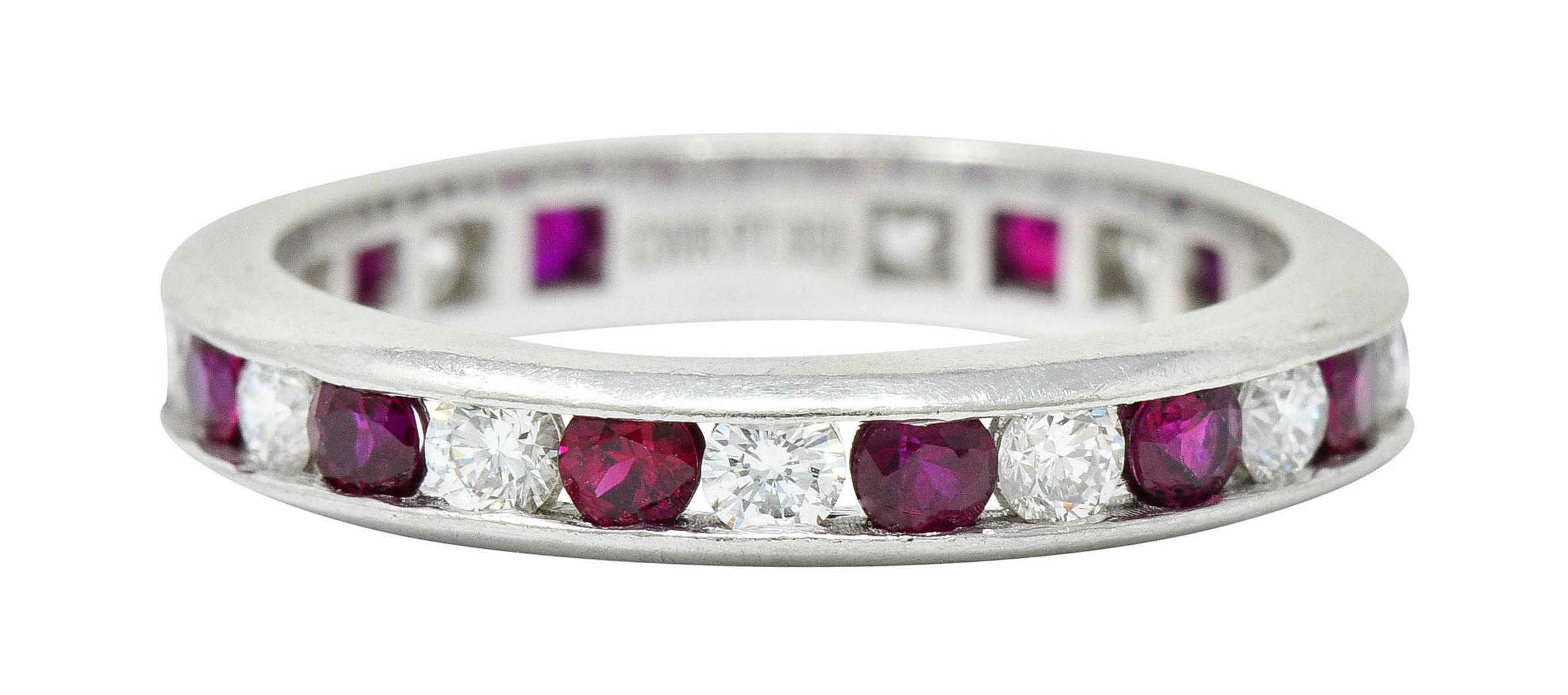 Eternity band ring channel set fully around with diamonds and rubies, alternating

Rubies are well-matched and bright red while weighing in total approximately 0.65 carat

Round brilliant cut diamonds weigh in total approximately 0.91 carat; H to J