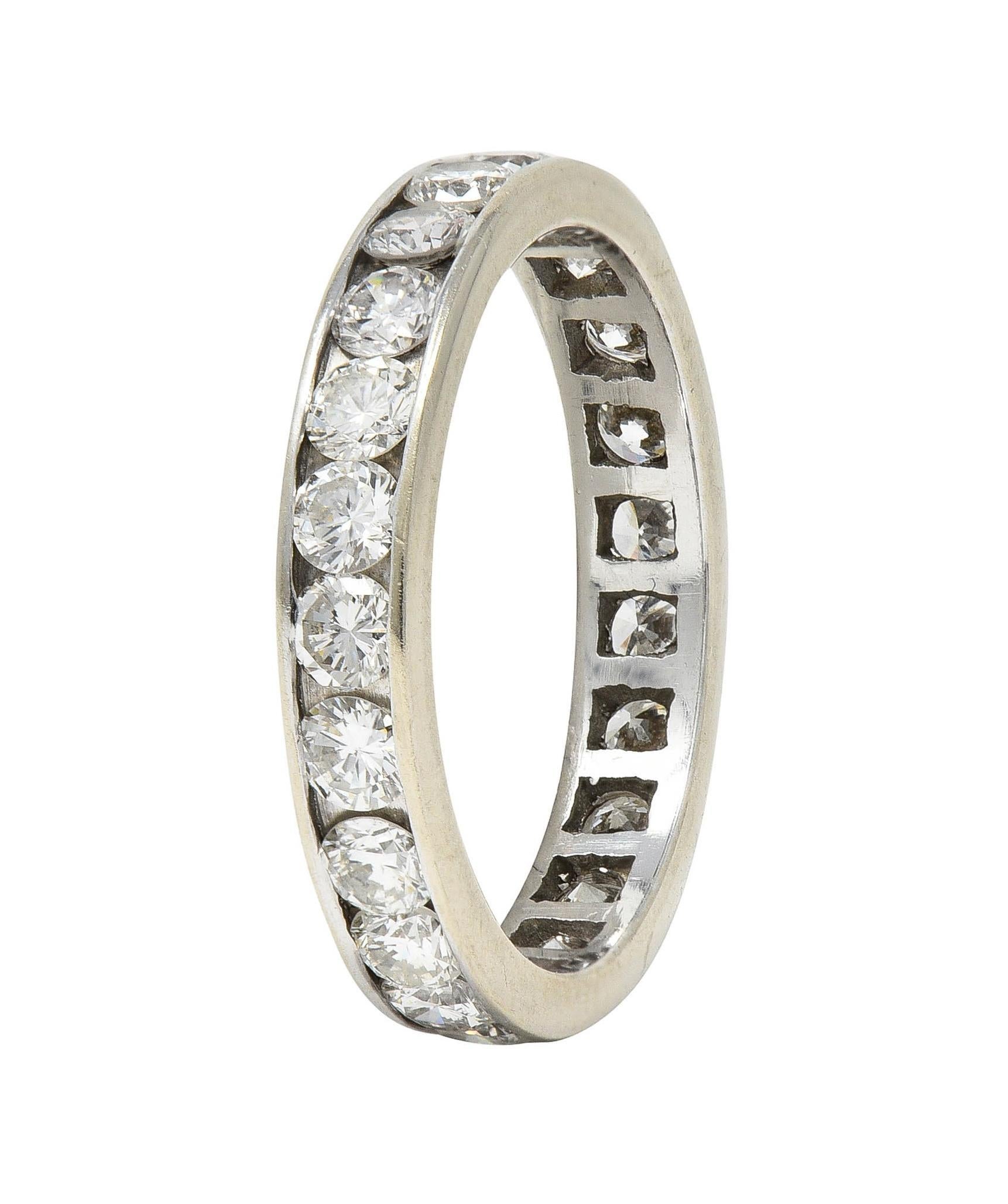 Featuring round brilliant cut diamond channel set fully around 
Weighing approximately 1.61 carats total 
G/H color and VS to SI clarity
With high polish finish
Tested as 14 karat white gold
Circa: 2000s
Ring Size: 6 3/4 and not sizable 
Measures