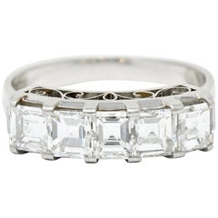Contemporary 1.62 Carat Step Cut Diamond Platinum Five-Stone Band Ring