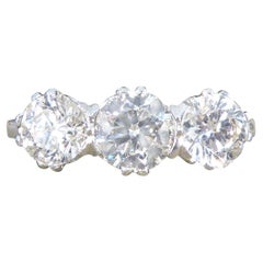 Contemporary 1.62 Carat Brilliant Cut Diamond Three Stone Ring in Platinum