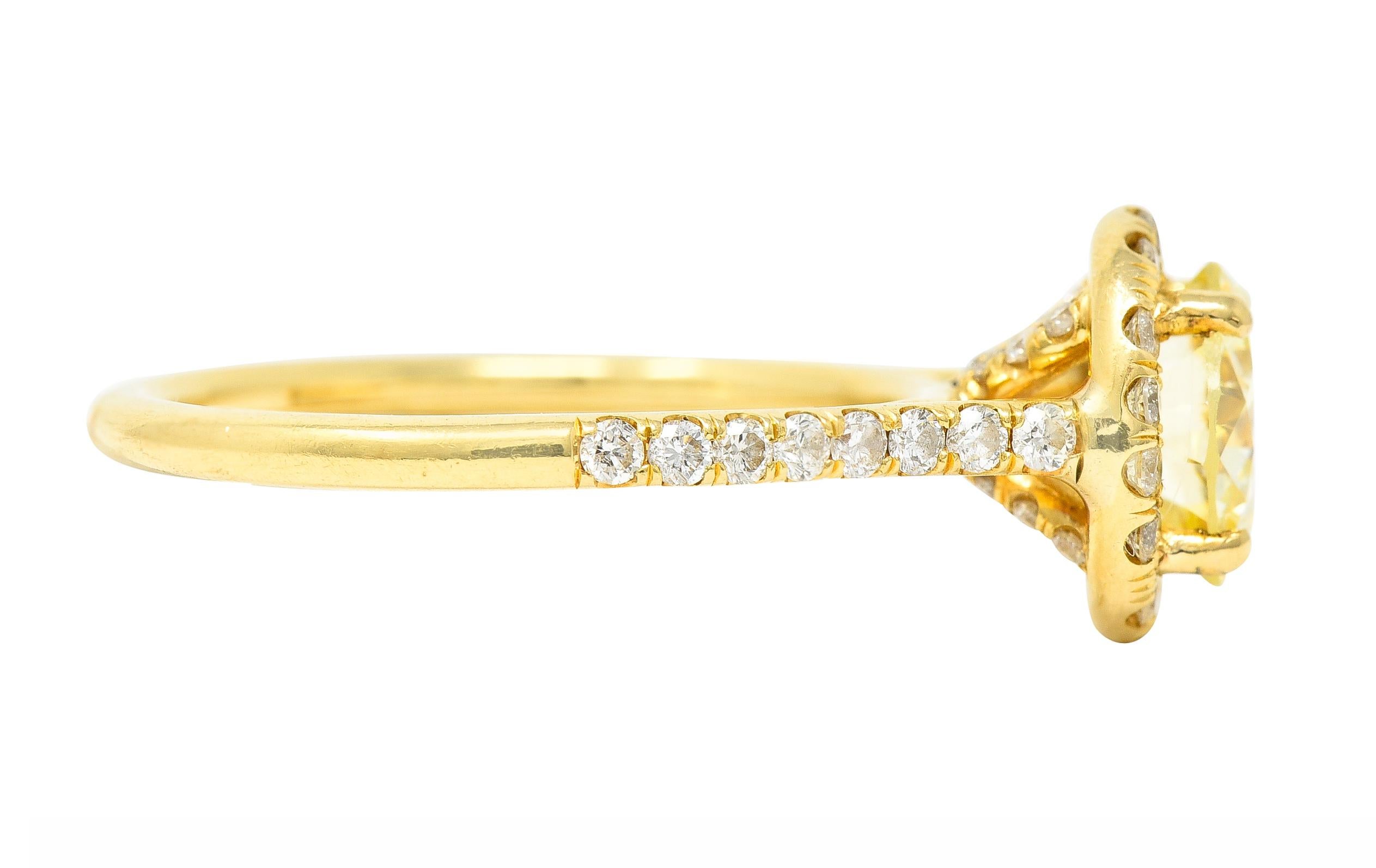 Contemporary 1.65 Carats Fancy Light Yellow Diamond 18 Karat Gold Halo Ring In Excellent Condition For Sale In Philadelphia, PA