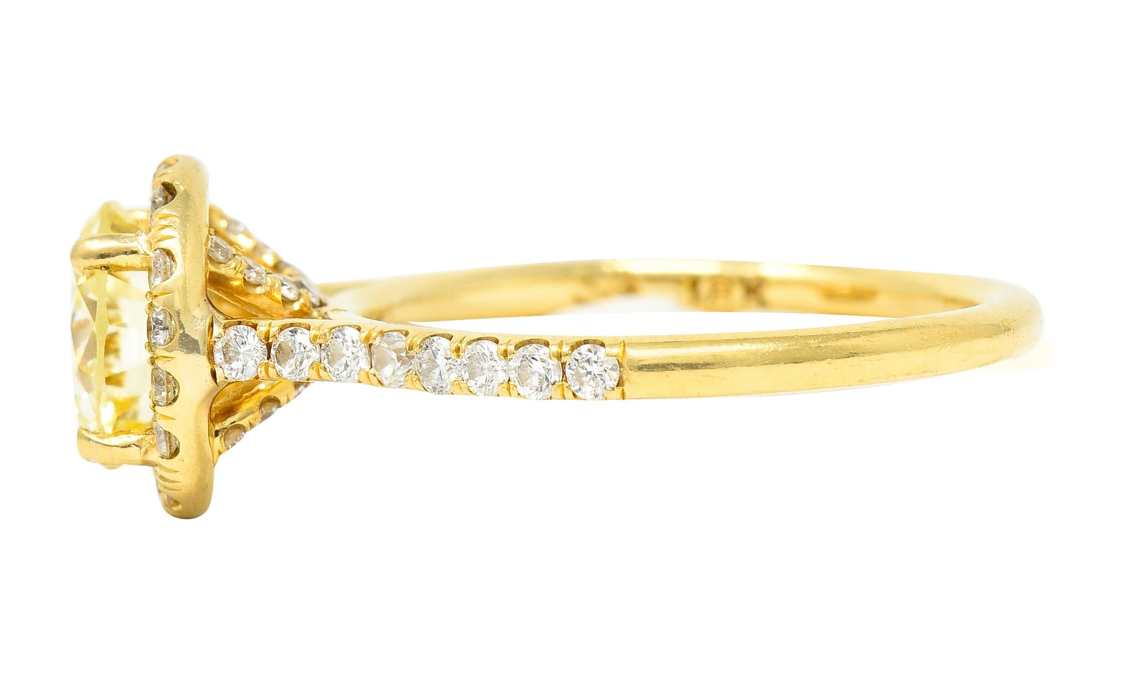 Contemporary 1.65 Carats Fancy Light Yellow Diamond 18 Karat Gold Halo Ring For Sale 1