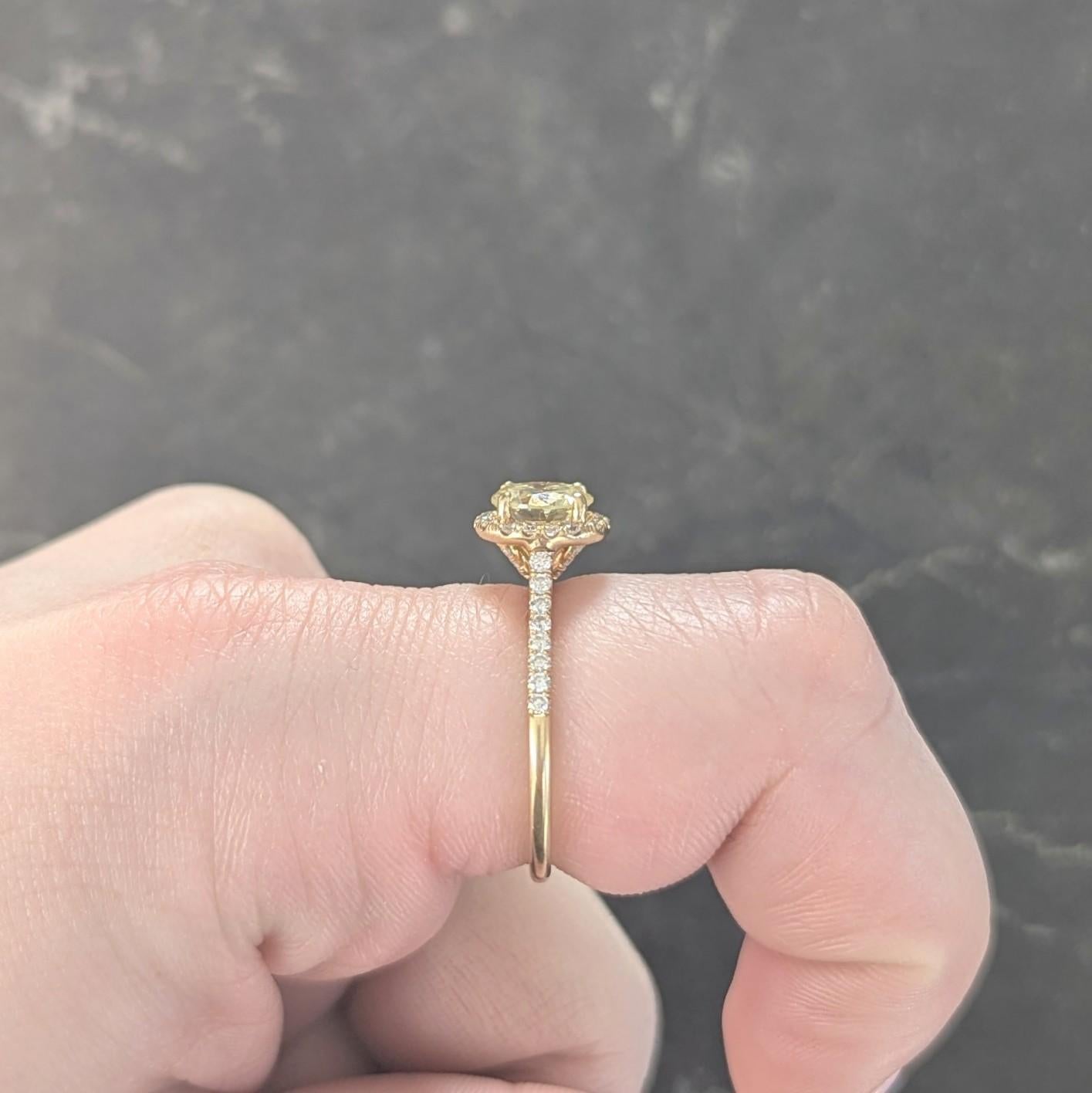 Contemporary 1.65 CTW Fancy Yellow Diamond 18K Gold Halo Engagement Ring GIA For Sale 8