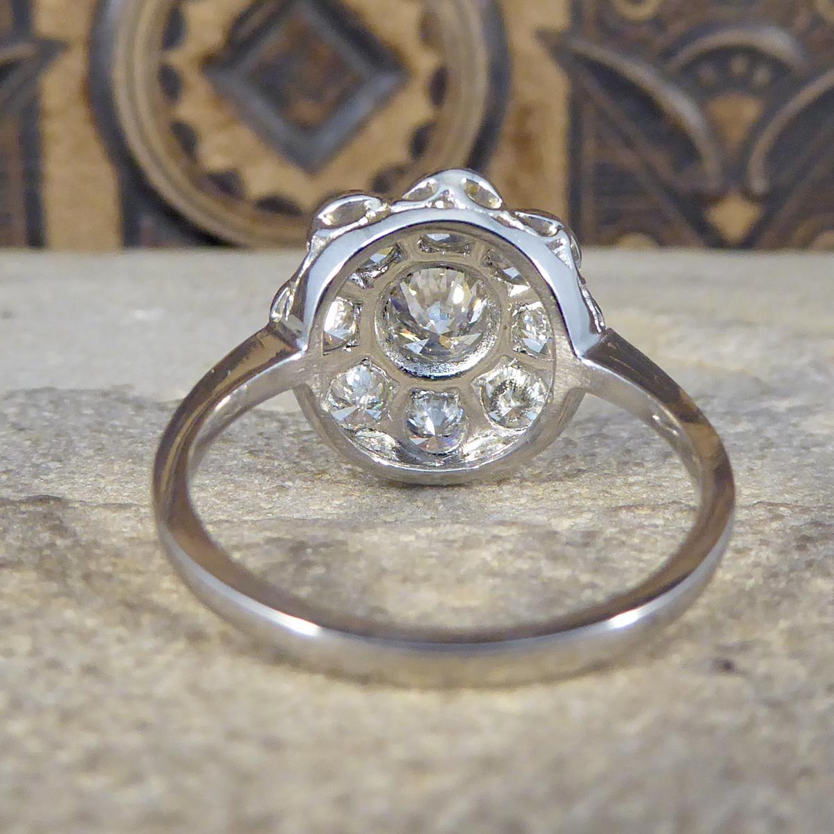 Round Cut Contemporary 1.70 Carat Total Diamond Daisy Cluster Ring in Platinum