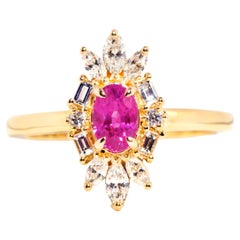 Contemporary 18 Carat Gold Oval Vivid Pink Sapphire & Diamond Halo Cluster Ring