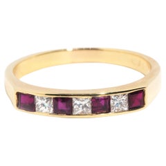 Contemporary 18 Carat Yellow Gold Channel Set Ruby and Diamond Band Ring