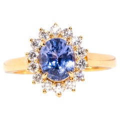 Contemporary 18 Carat Yellow Gold Oval Ceylon Sapphire and Diamond Cluster Ring