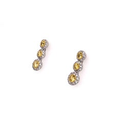 Contemporary 18 Karat White Gold Fancy Yellow Diamond Graduating Drop Earrings