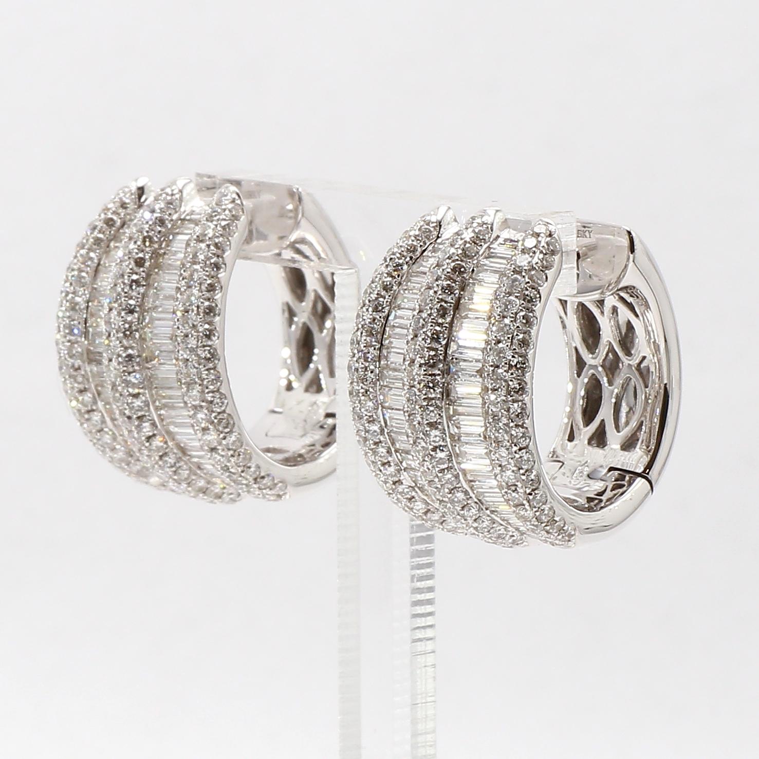 Elegantly handcrafted pair of Contemporary Diamond Hoop Earrings.
Round Brilliant Cut White Diamonds totalling 2.12 ct G-H Color, VS-SI Clarity and Baguette Cut White Diamonds totalling 1.58 ct G-H Color, VS-SI Clarity
Pave Set Diamond Designer
