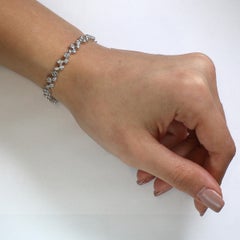 Contemporary 18 Karat White Gold White Diamond Bracelet Bezel Set