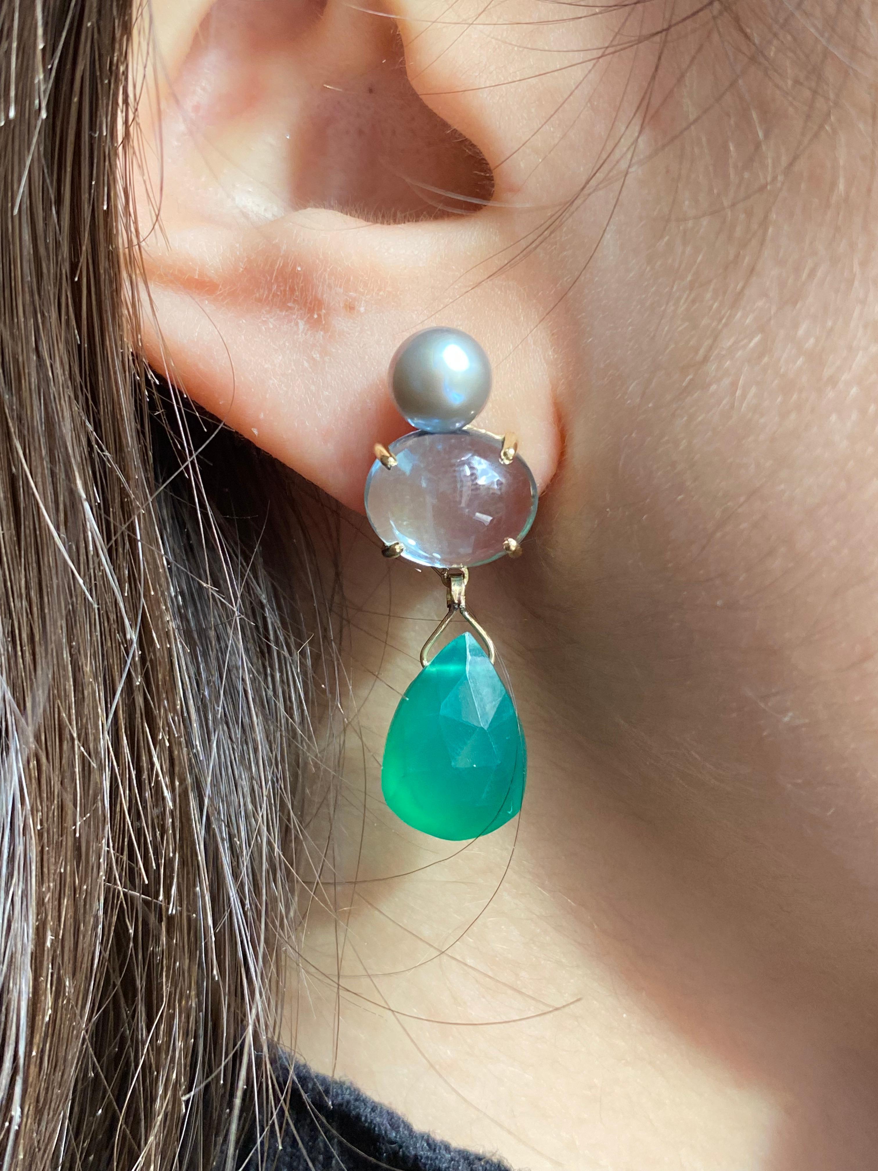 Rossella Ugolini Design Collection, a beautiful shade of light blue and green made in 18 Karat White Gold Light Blue Topaz Green Agate.
These contemporary Design earrings are handcrafted in 18 Karats Yellow Gold  easy wear.
Simple and elegant with a